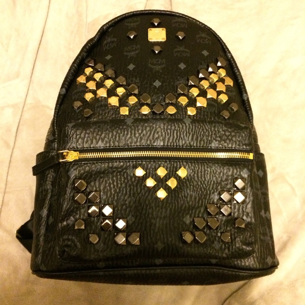 mcm medium backpack in black with studs